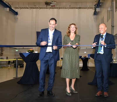Formal ribbon cutting by Marco Massaro, Head of ESA’s Estates and Facilities Management Division; Paulien van Essen, Regional Manager of lead builder Heijmans and Torben Henriksen, Head of ESTEC and ESA Director of Technology, Engineering and Quality. Image credit: ESA