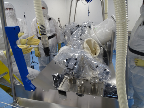 Figure 1. Personnel and static sampling during contaminated enclosure disposal