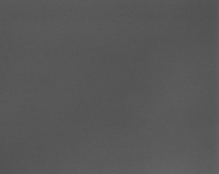 Comparative SEM image showing bulk glass on vial sidewall without any sign of surface attack