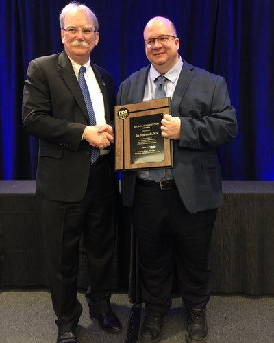 Polarine accepts <br> Parenteral Drug Association award