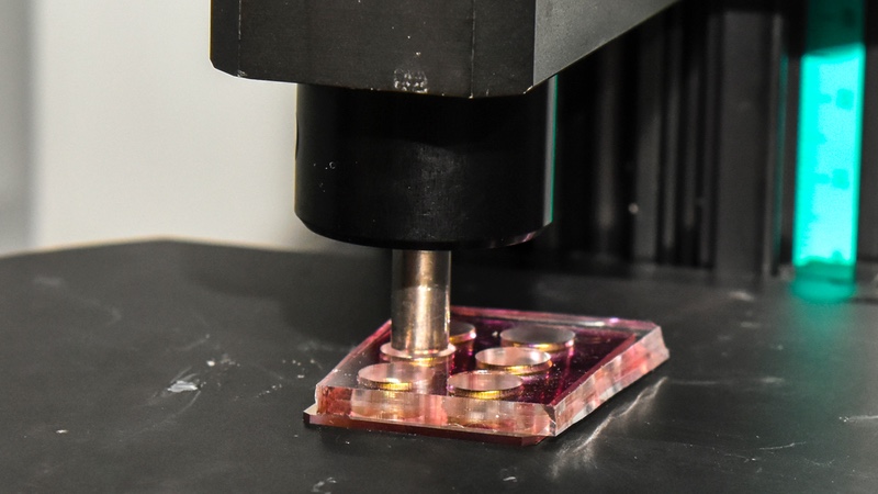 A nanomushroom chip undergoing testing with an LSPR device. Image credit OIST