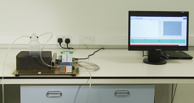 Figure 3: Bottle connected to the particle counter with bottle neck open